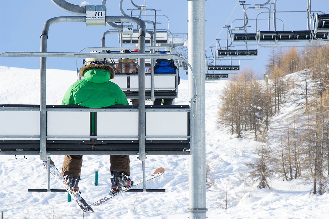Free image: Skier on a chairlift